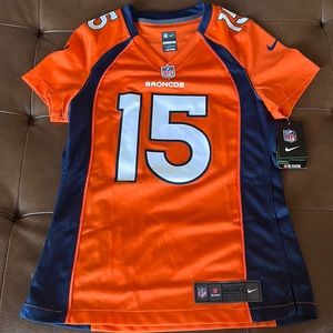 Brand new with tags Women’s Tebow Broncos jersey. Size medium.